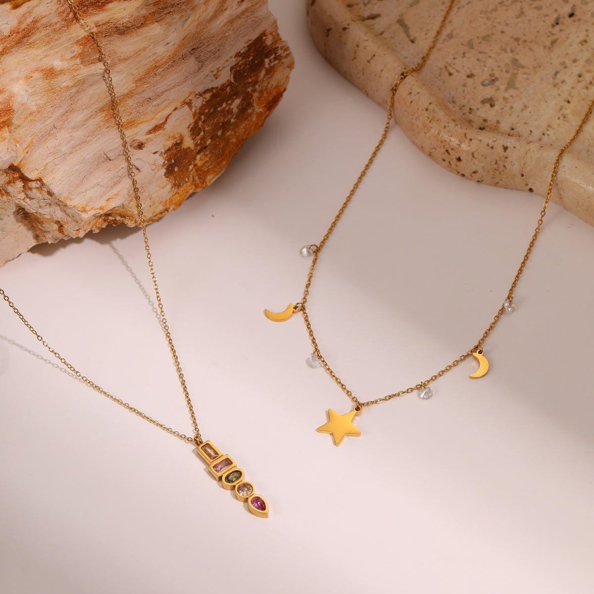 Gold-tone star and moon charm necklace – photo 3