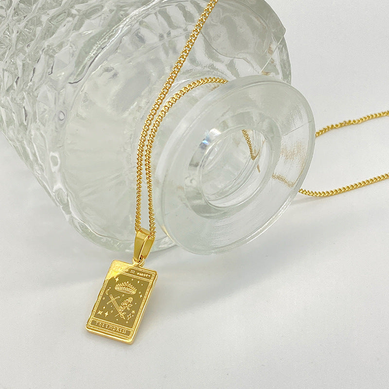Gold-tone engraved tarot card pendant necklace – photo 3