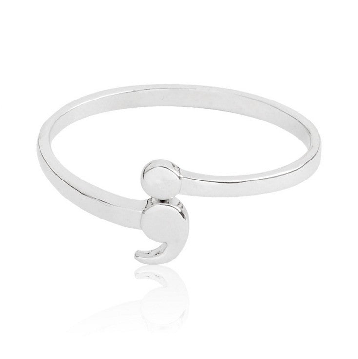 Silver-tone semicolon ring