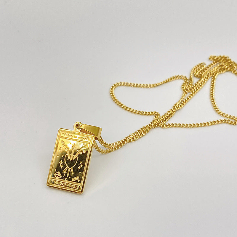 Gold-tone engraved tarot card pendant necklace – photo 20