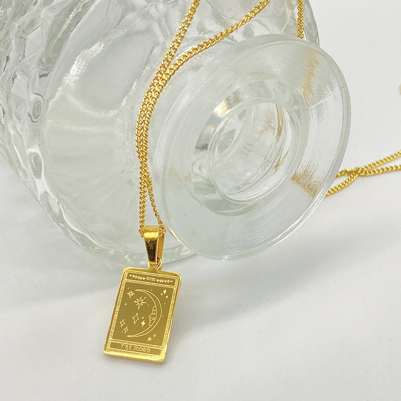 Gold-tone engraved tarot card pendant necklace – photo 6