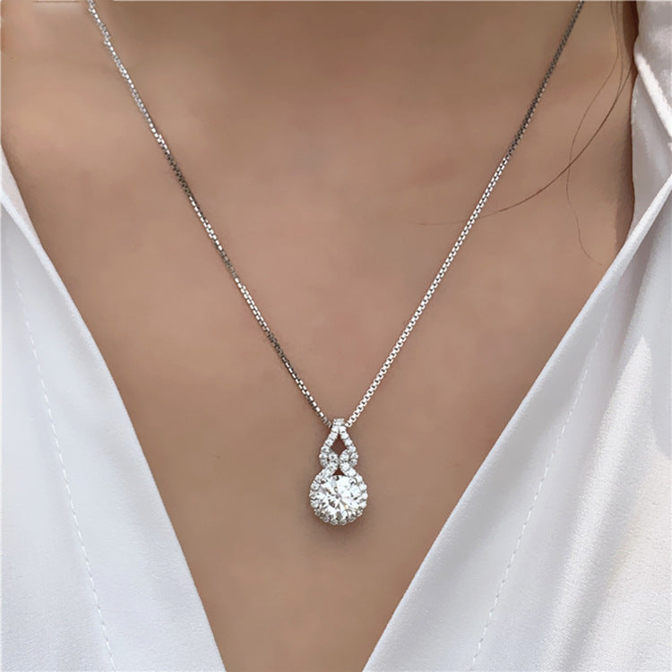 Sparkling round halo pendant necklace on a silver-tone chain – photo 4