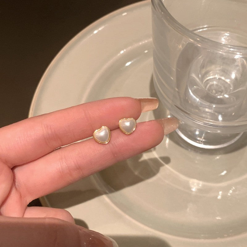 Dainty gold-tone open heart stud earrings – photo 3