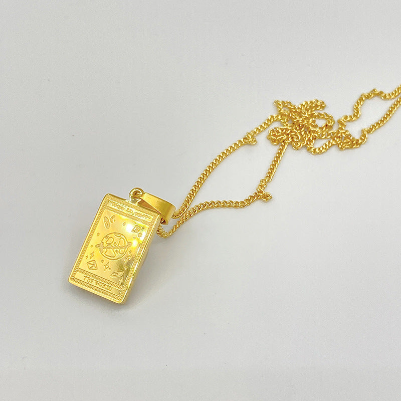 Gold-tone engraved tarot card pendant necklace – photo 19