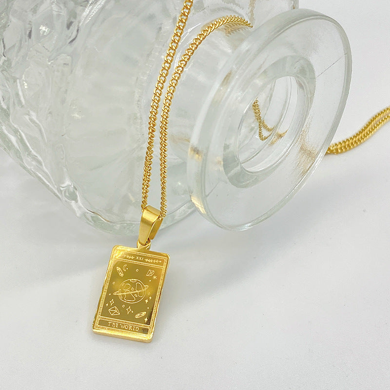 Gold-tone engraved tarot card pendant necklace – photo 9