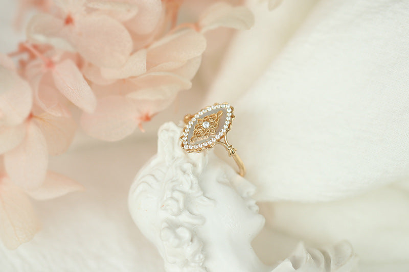 Gold-tone marquise ring with shell-look inlay – photo 3