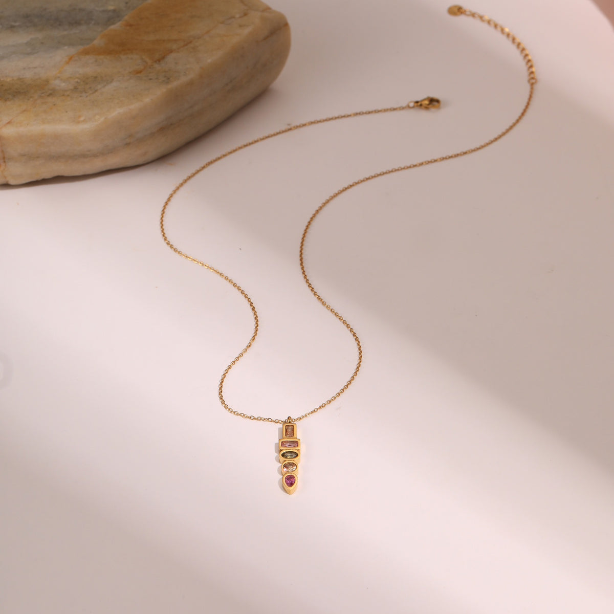 Gold-tone star and moon charm necklace – photo 6