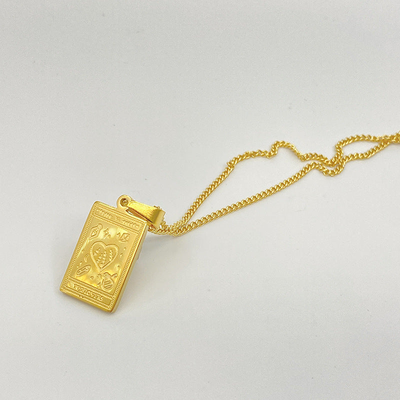 Gold-tone engraved tarot card pendant necklace – photo 15