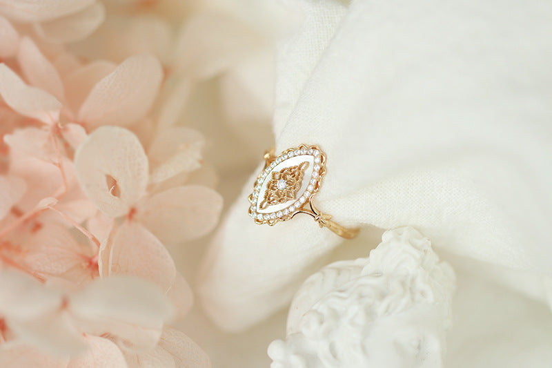 Gold-tone marquise ring with shell-look inlay – photo 2