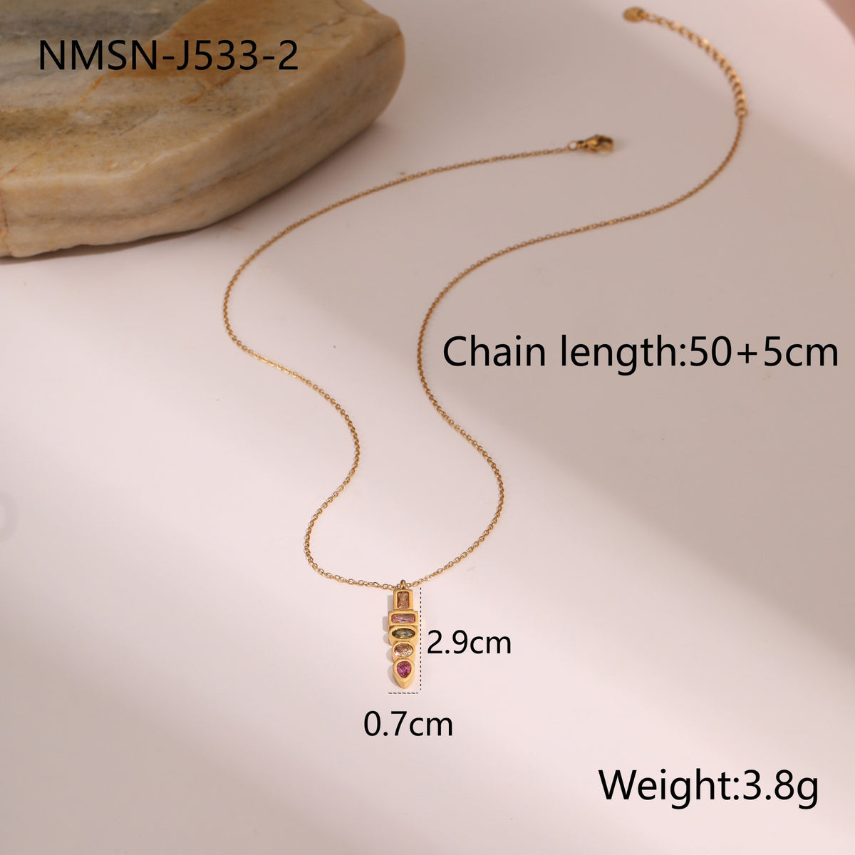 Gold-tone star and moon charm necklace – photo 4