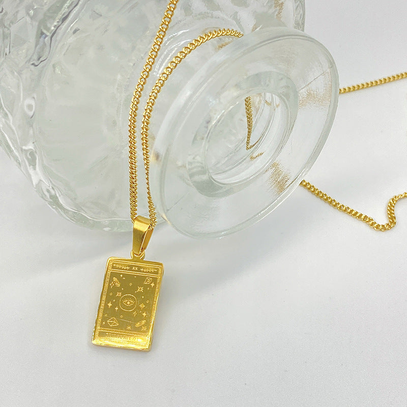 Gold-tone engraved tarot card pendant necklace – photo 5