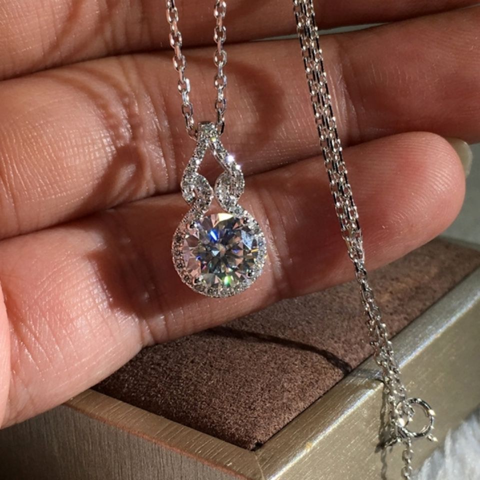 Sparkling round halo pendant necklace on a silver-tone chain – photo 5