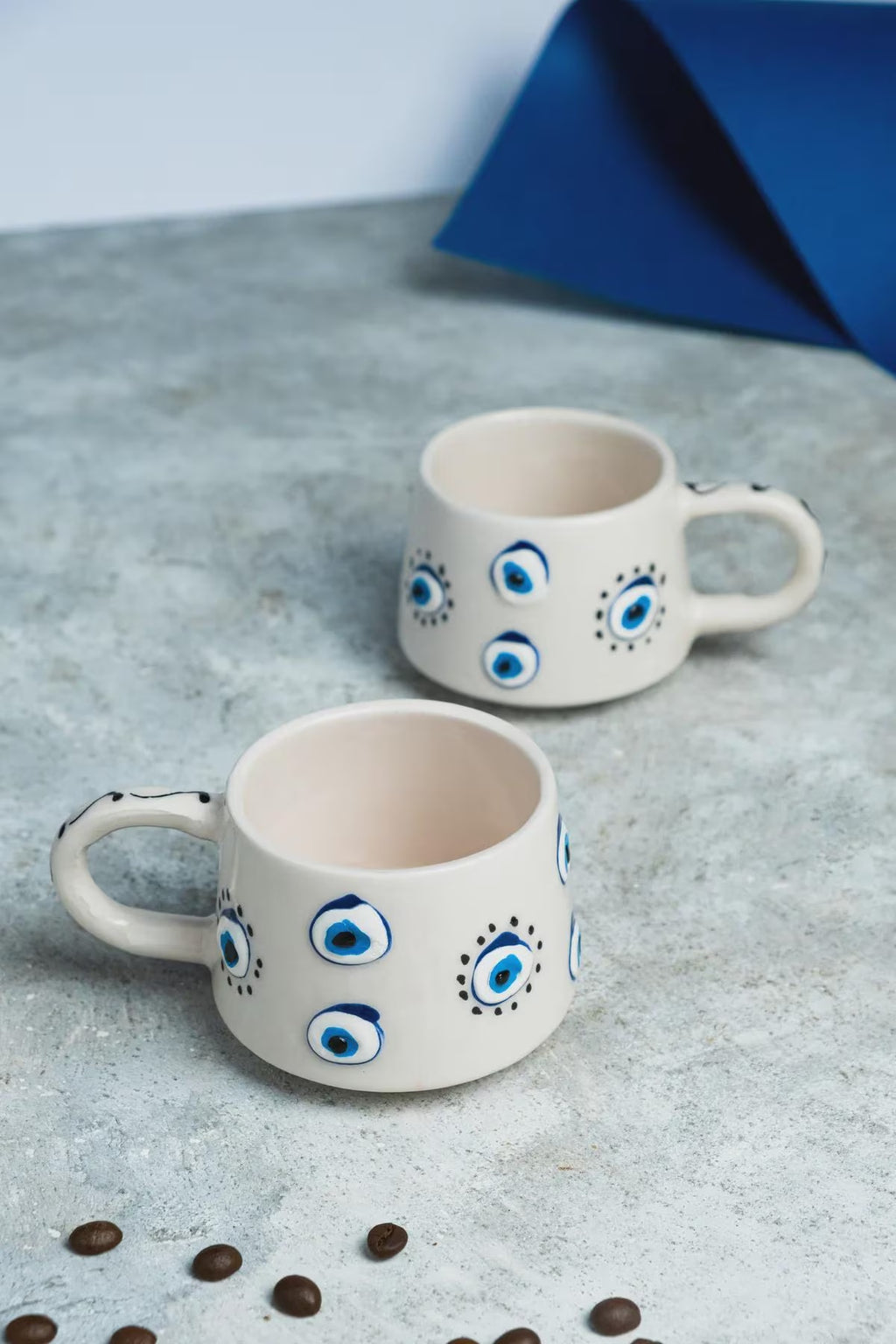 Handmade ceramic evil eye mug set of two – photo 2