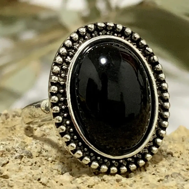 Vintage silver-tone oval statement ring with black stone – photo 4