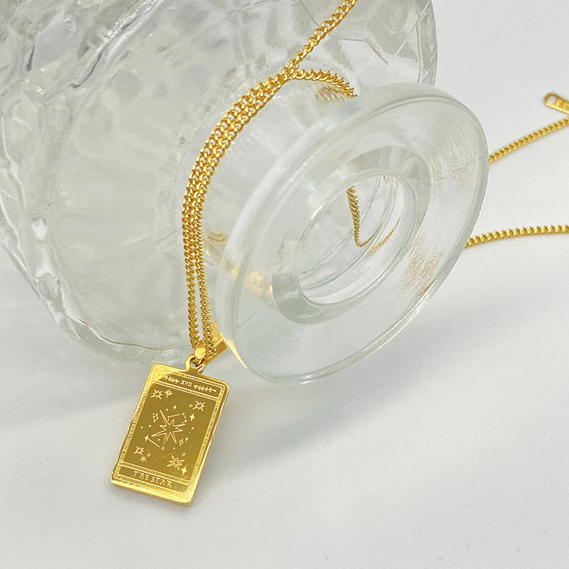Gold-tone engraved tarot card pendant necklace – photo 4