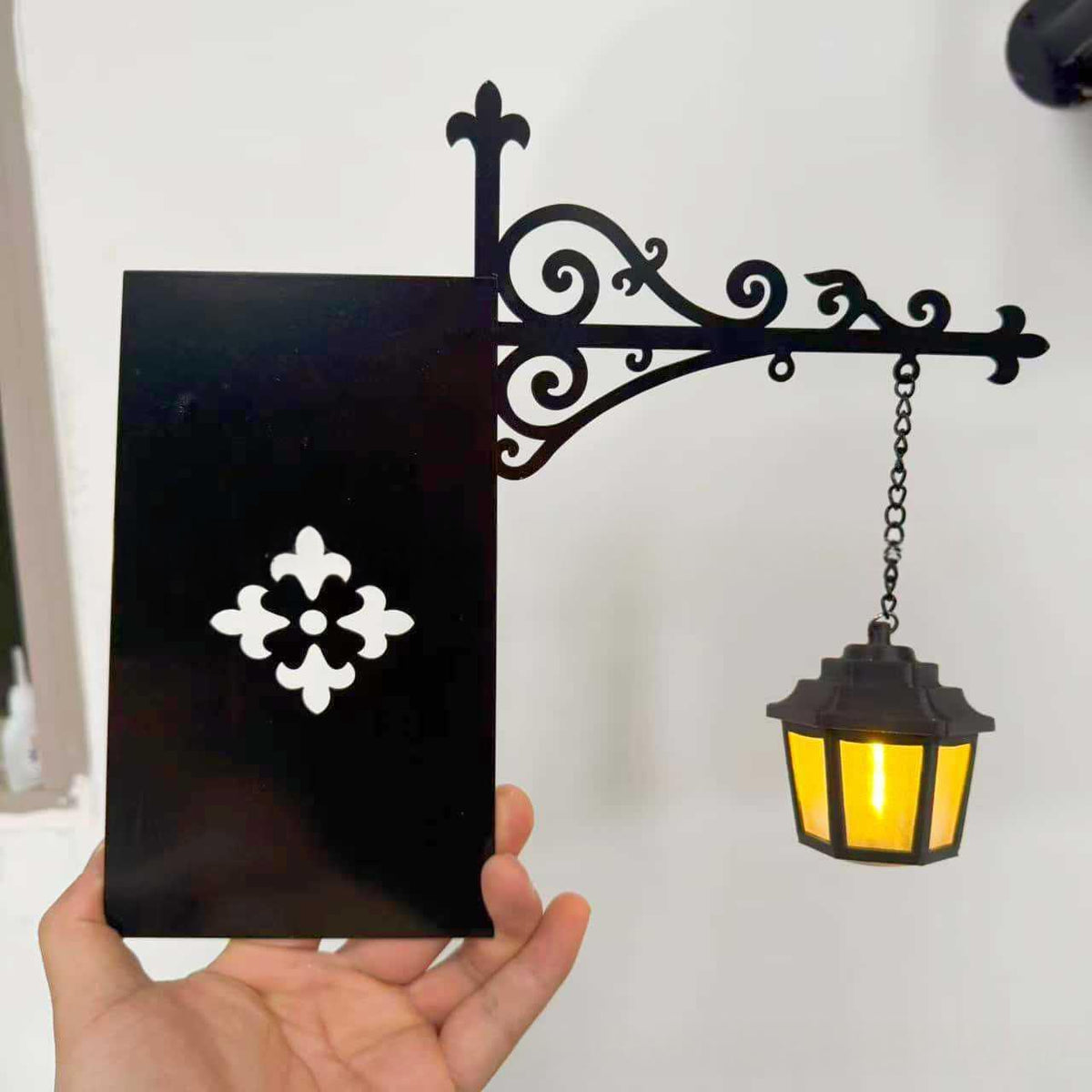 Mini black lantern lamp hanging from a scroll stand – photo 6