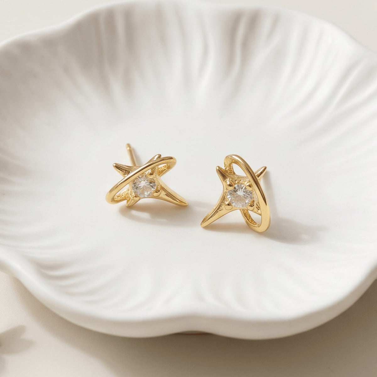 Dainty gold-tone star orbit stud earrings