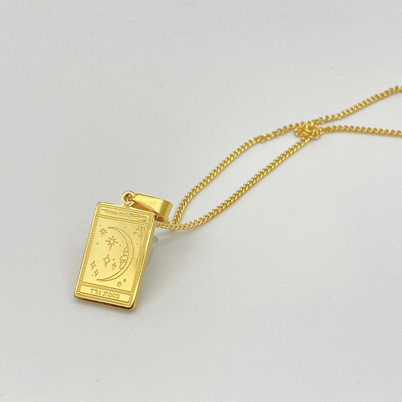 Gold-tone engraved tarot card pendant necklace – photo 16